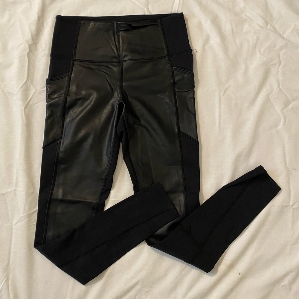 Athleta Black pocket leggings with paneling